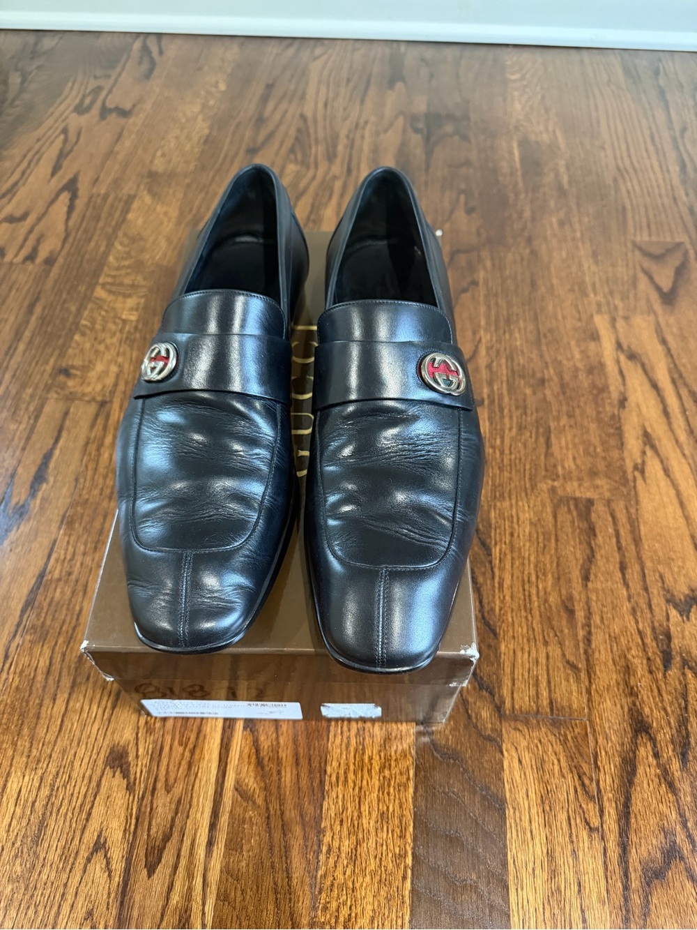 Gucci Black Leather Slip-On Loafers with Red & Gold Logo Medallions